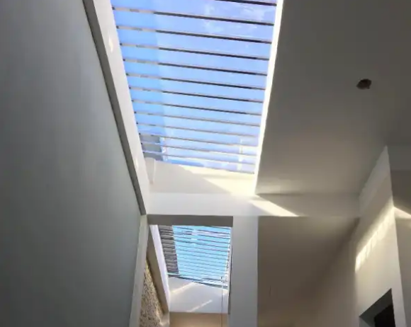 Mái che kính giếng trời nhà ống 1